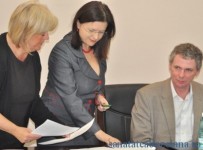 Cristina Vasile, semnand protocolul cu belgienii