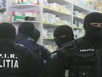 Perchezitii in zona Ramnicului, intr-un dosar de evaziune si comercializare de medicamente falsificate
